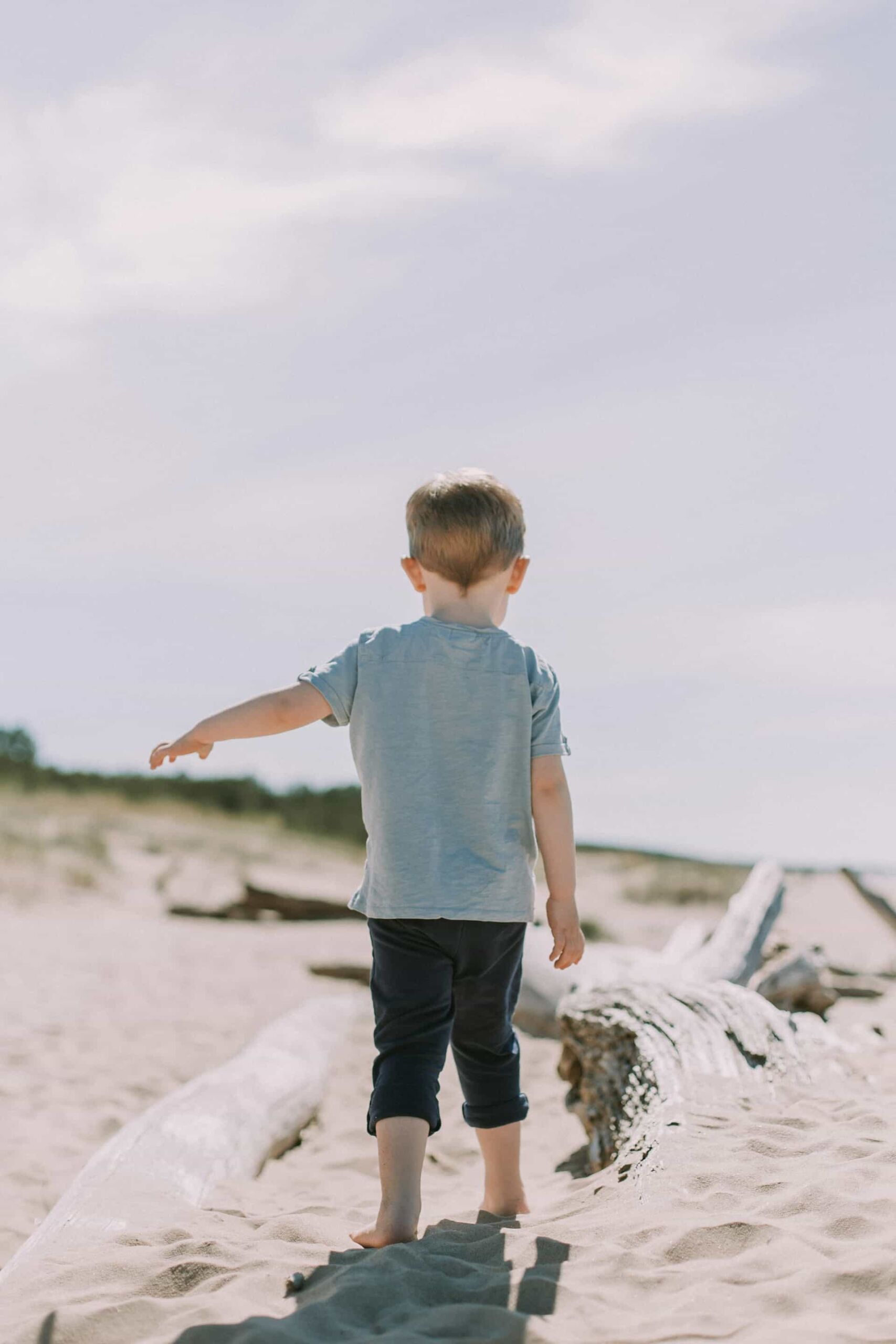 A child walking on sand